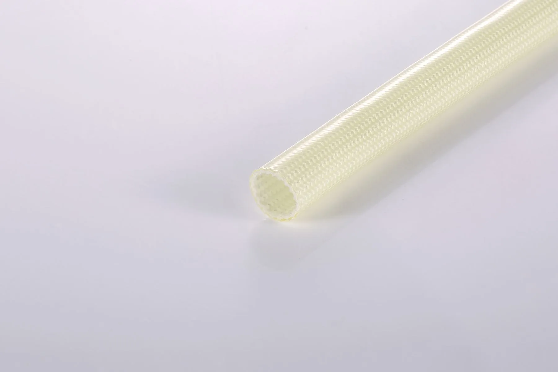 Acrylic coated fiberglass sleeving for motor winding and appliance insulation
